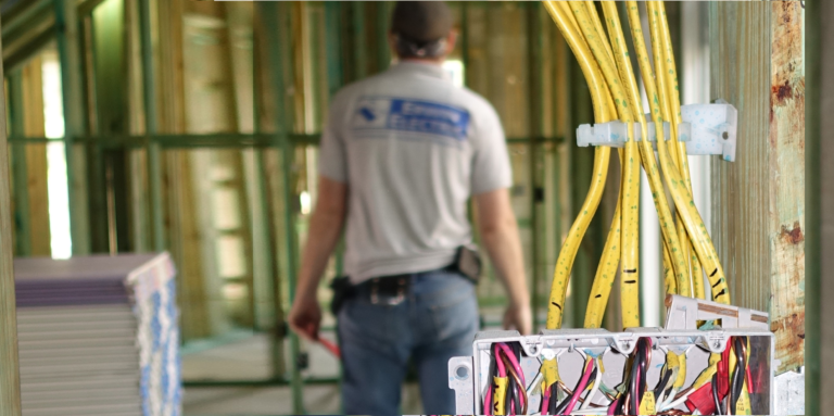 Electrical wiring and electrician at construction site