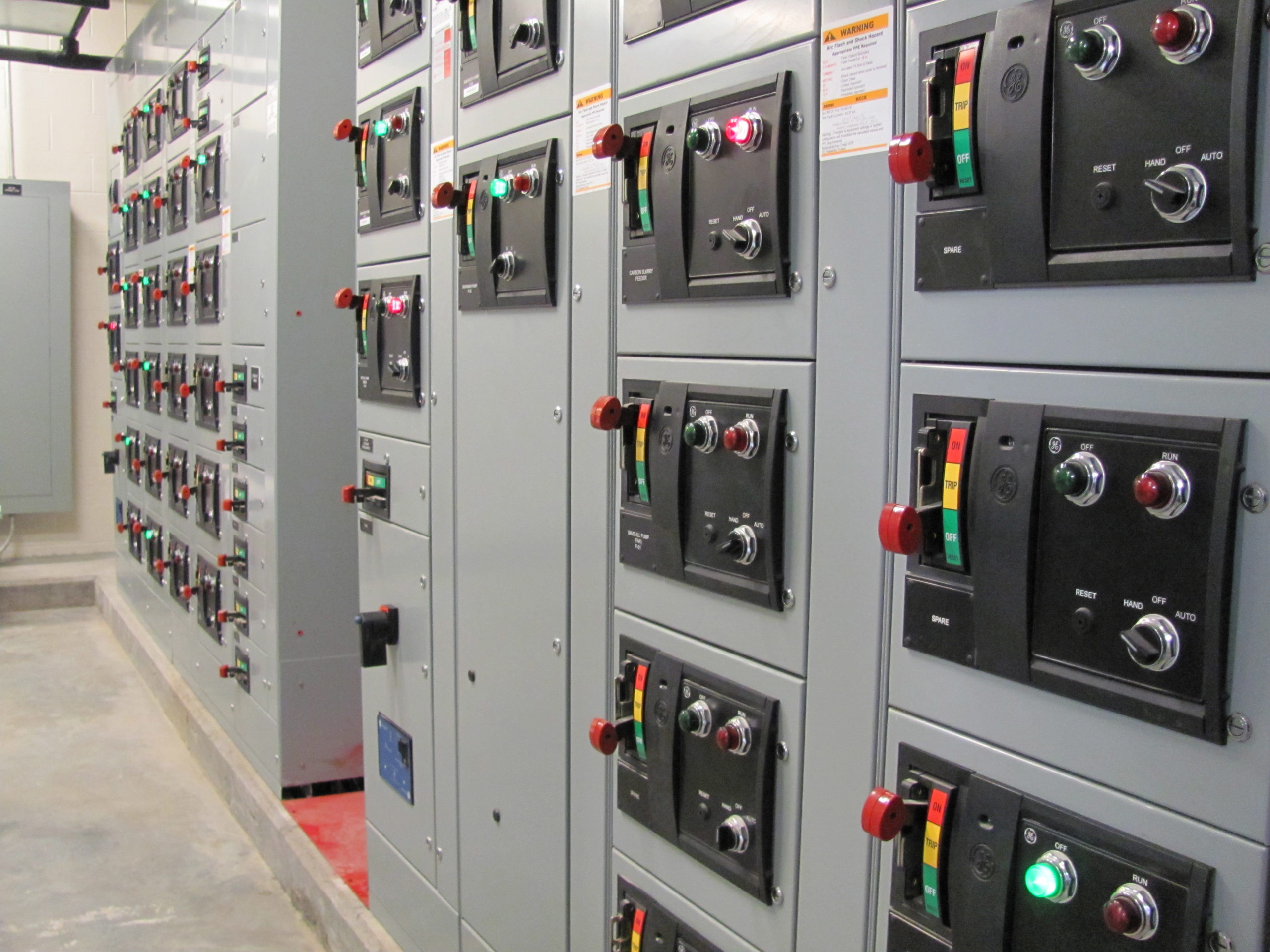 Row of industrial electrical control panels